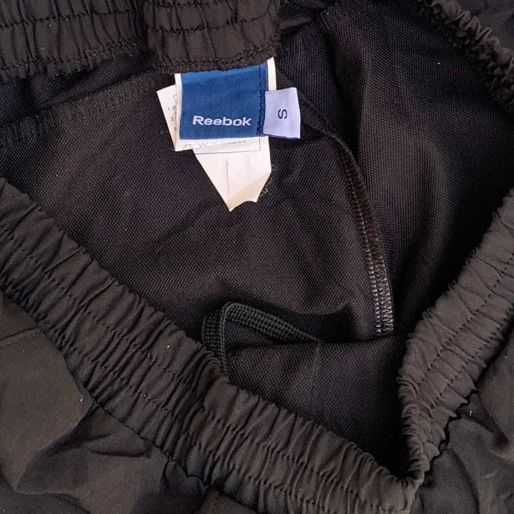 REBOOK TRACK PANTS