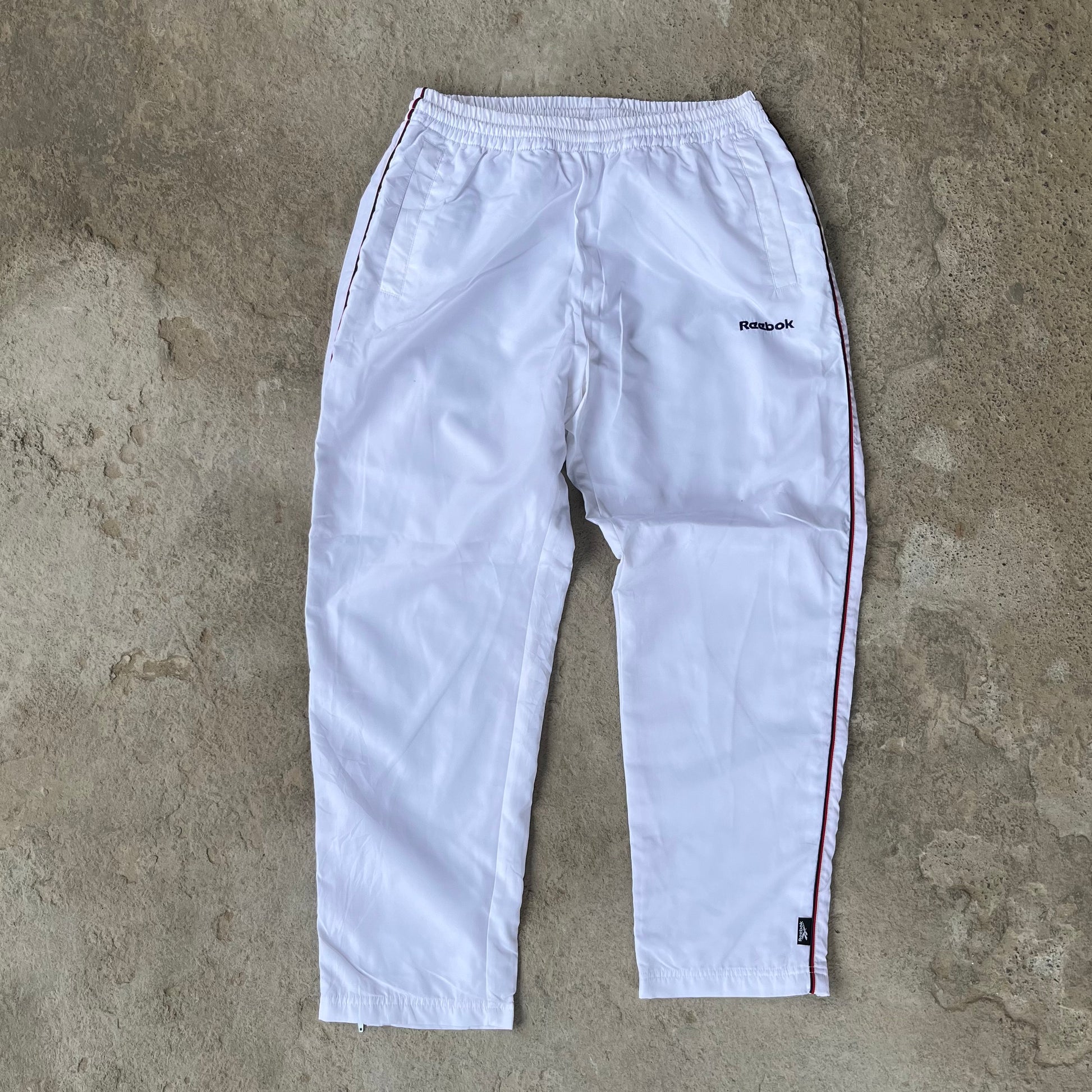 REEB0K TRACK PANTS