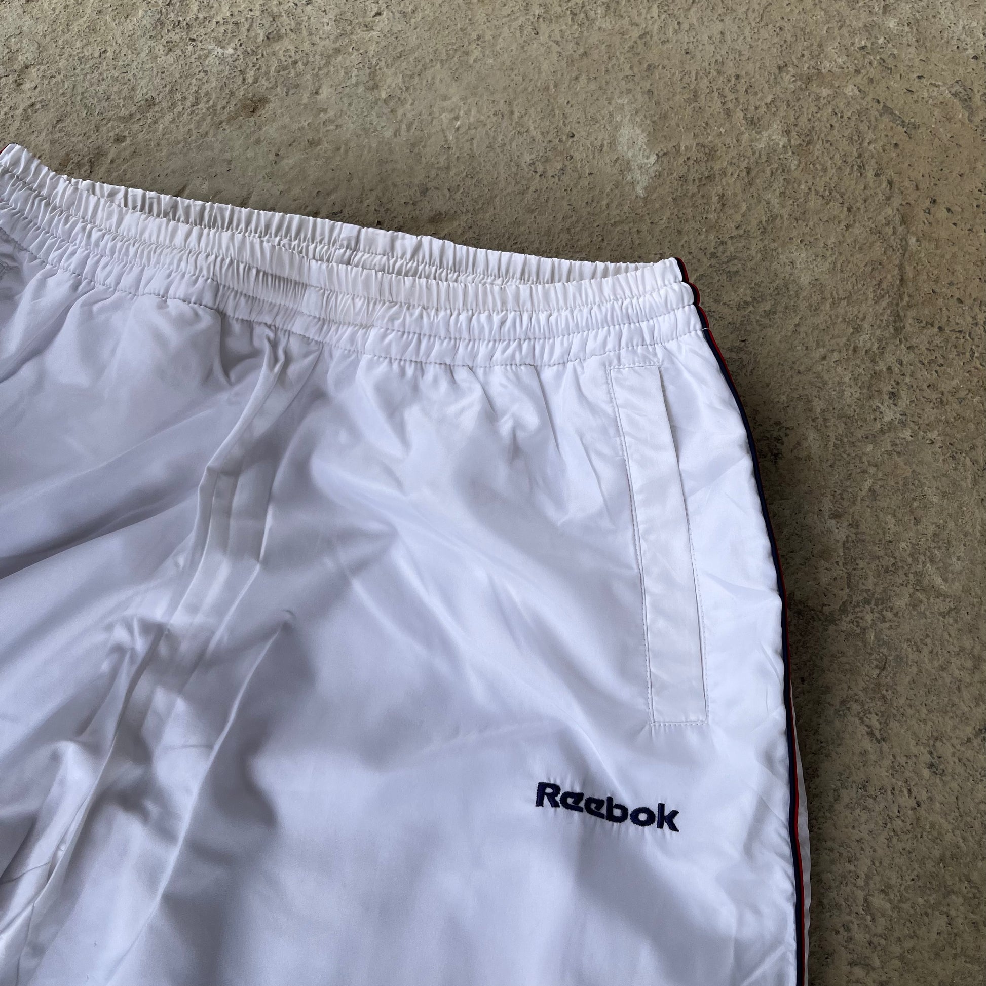 REEB0K TRACK PANTS