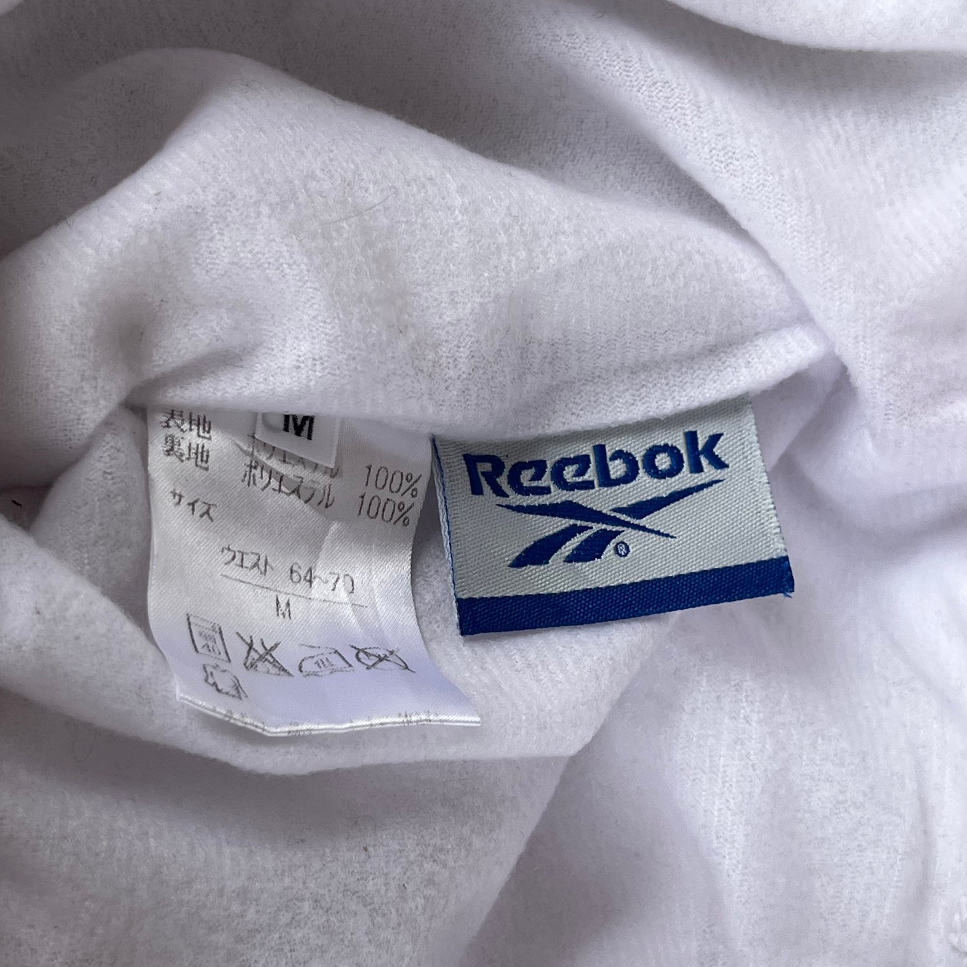 REEB0K TRACK PANTS