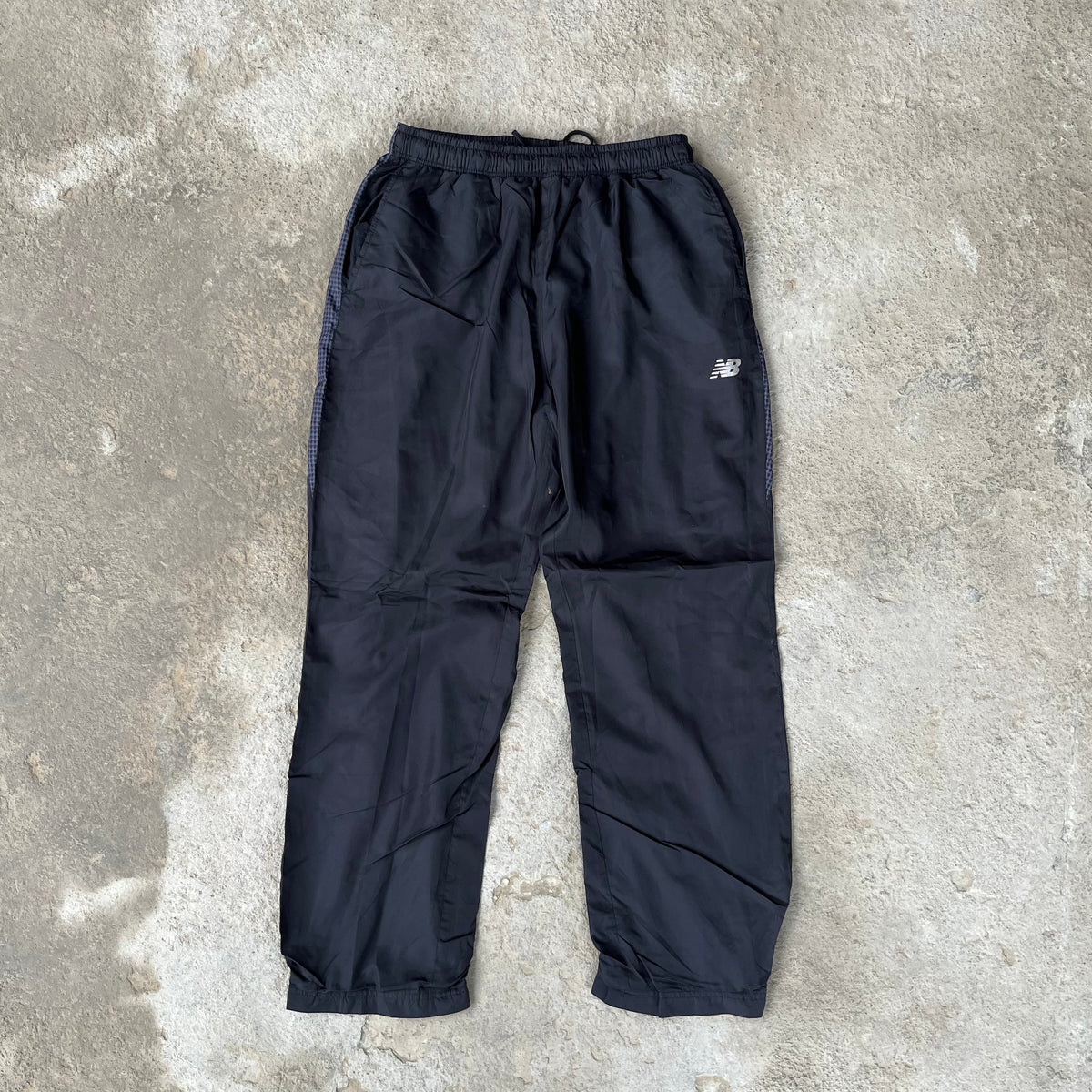 NEW BALANCE TRACK PANTS
