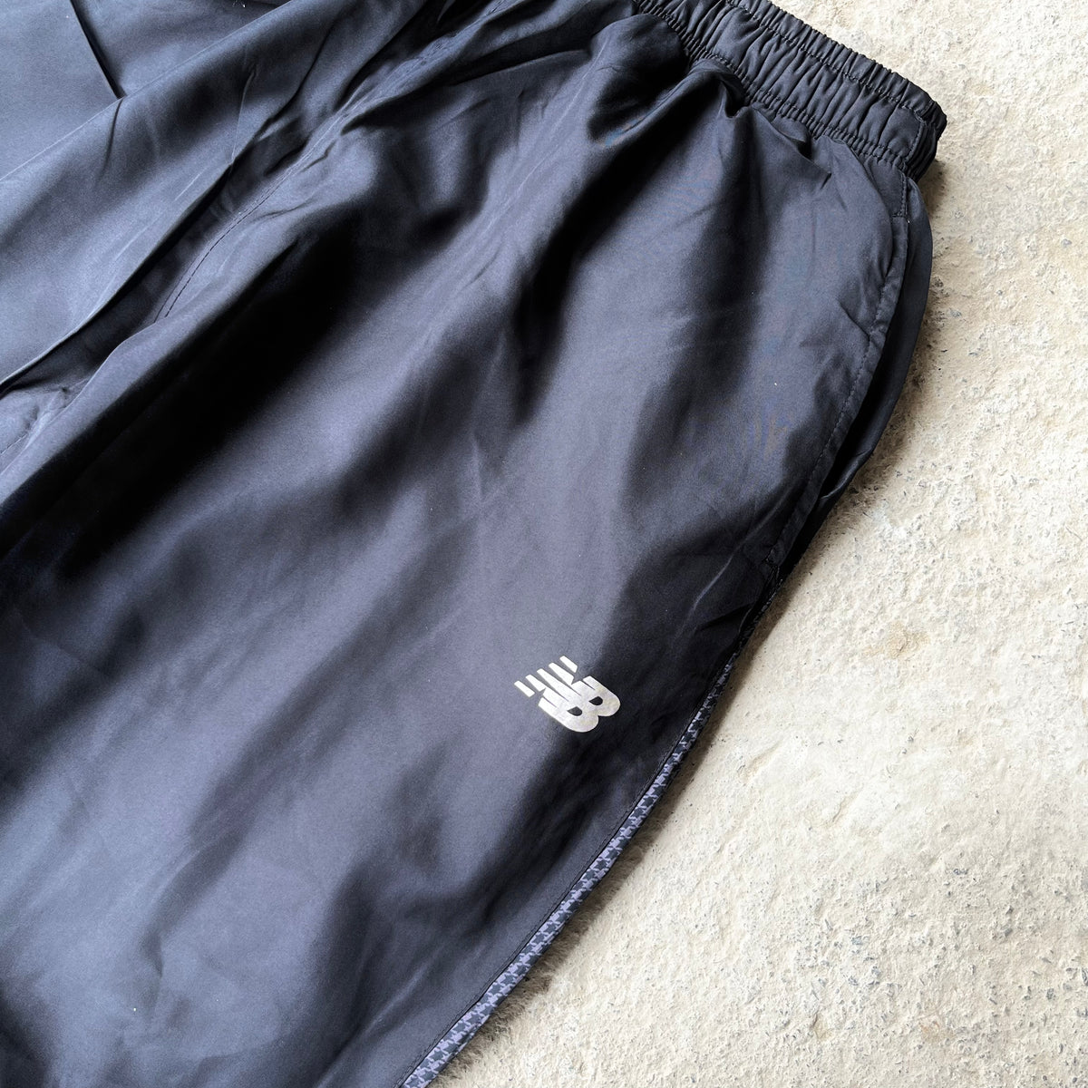 NEW BALANCE TRACK PANTS