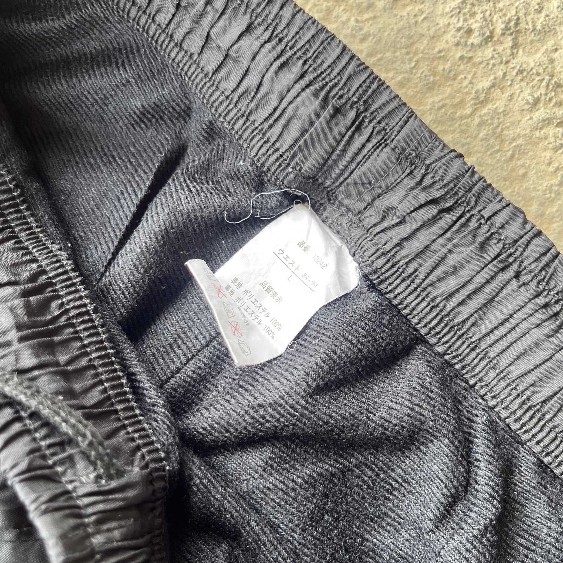 NEW BALANCE TRACK PANTS