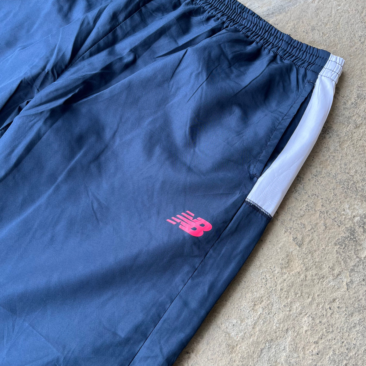 NEW BALANCE TRACK PANTS