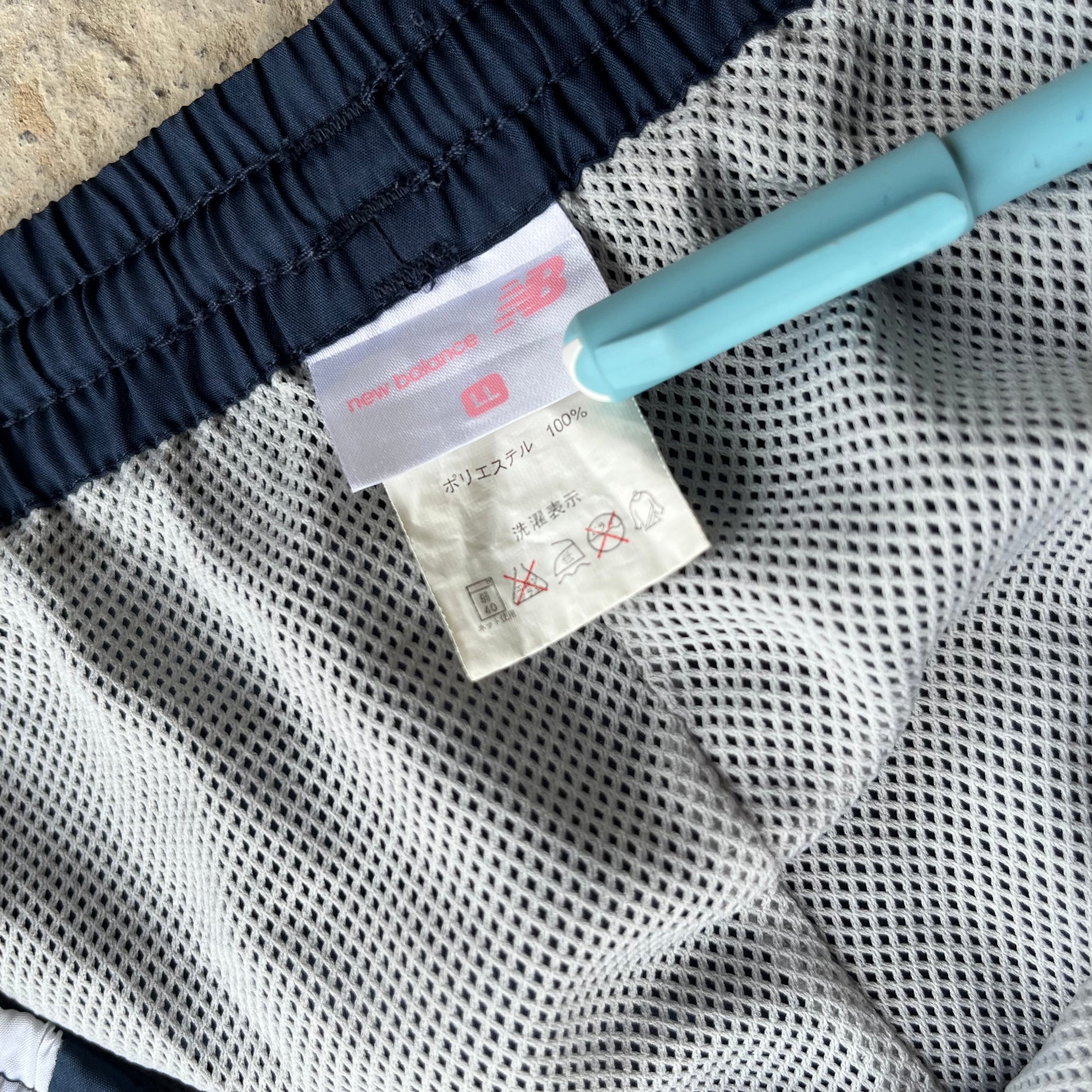 NEW BALANCE TRACK PANTS