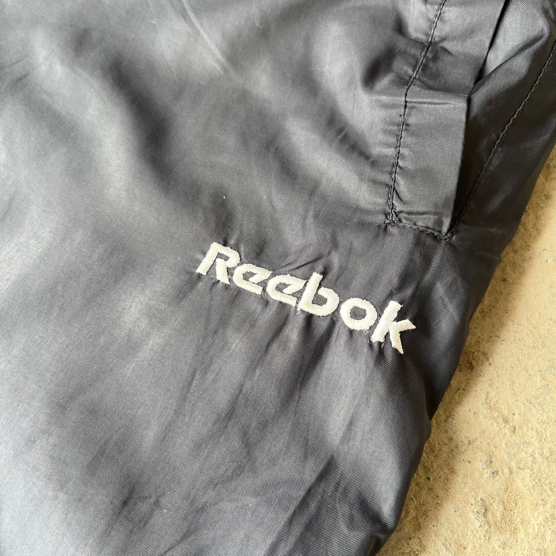 REEB0K TRACK PANTS