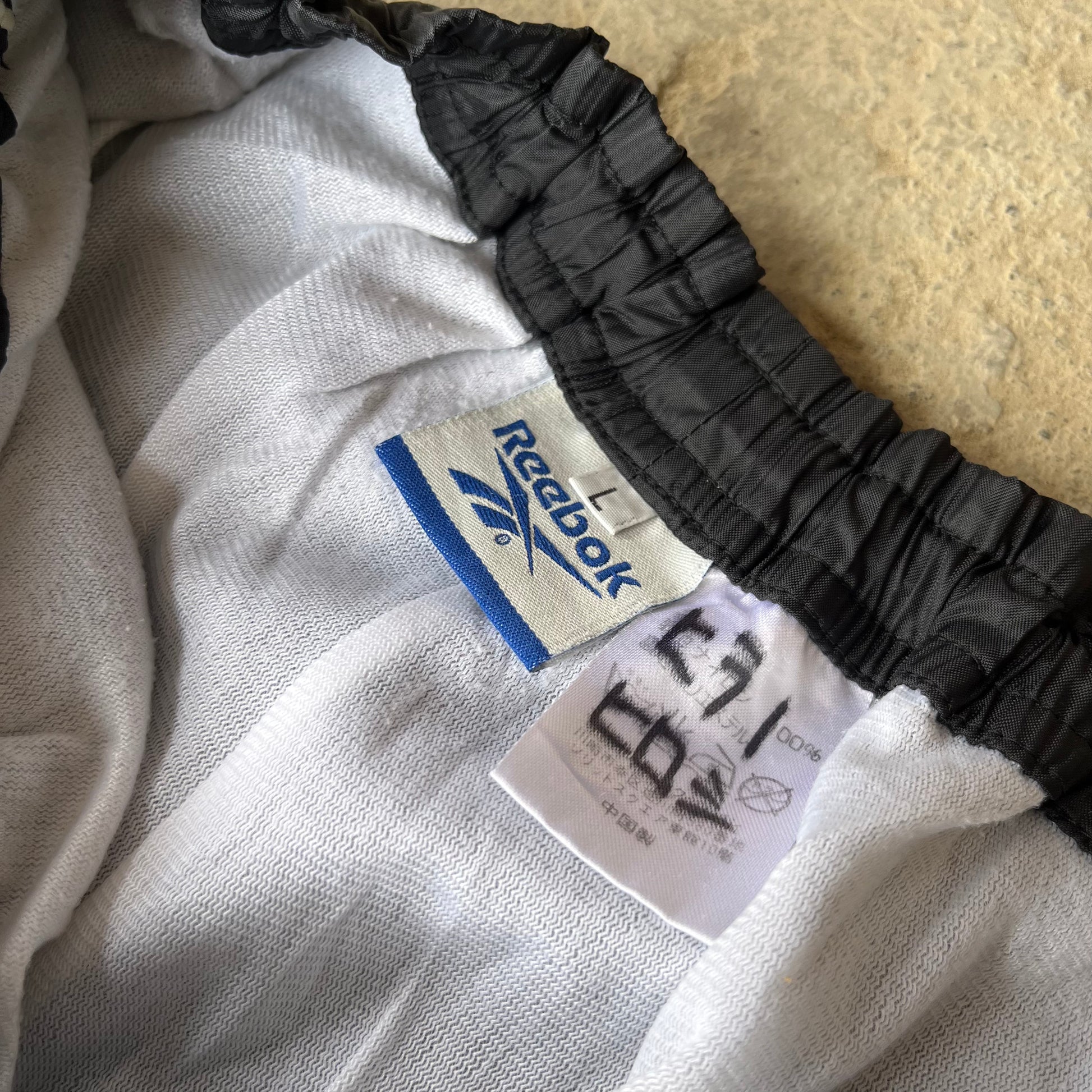 REEB0K TRACK PANTS